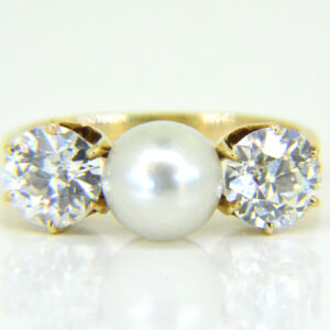Pearl and diamond three-stone ring