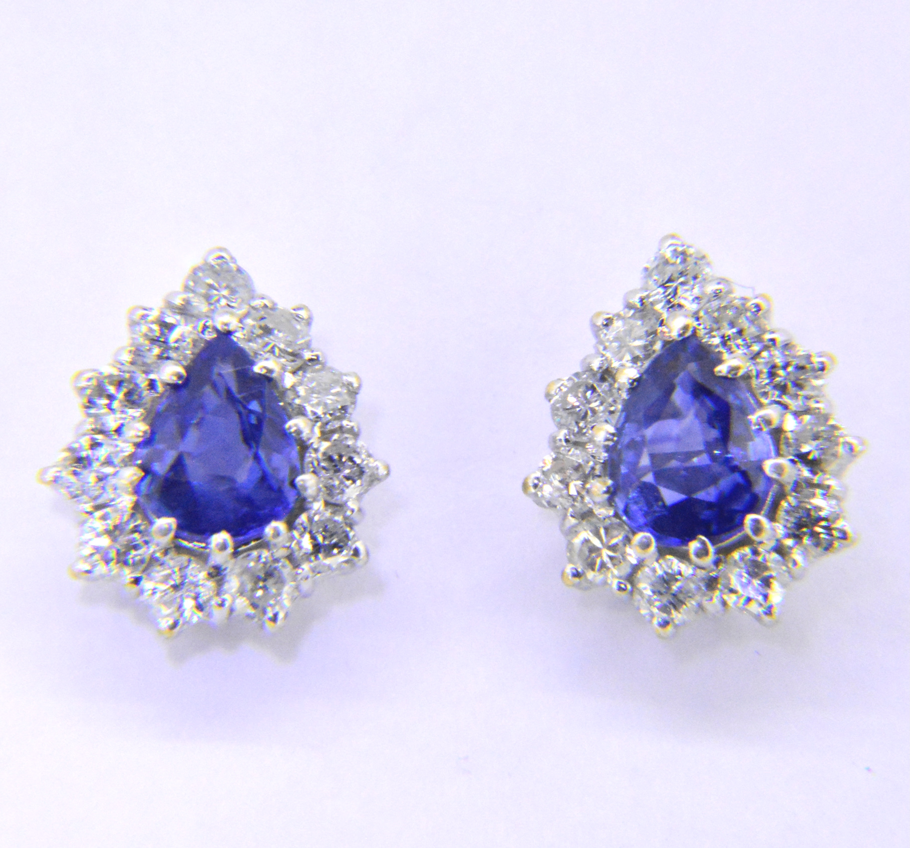 Sapphire and diamond pear-shaped ear-studs in 18ct white gold AUCTION ...
