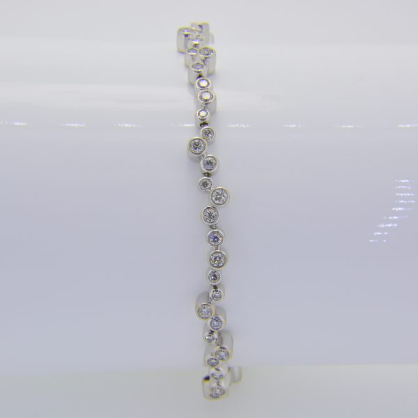 Diamond wavy-link bracelet set 18ct gold.