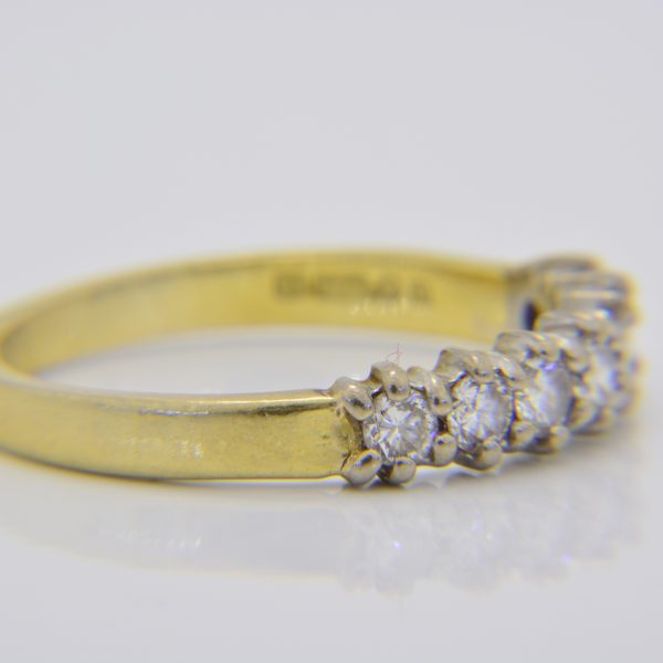 Diamond 7-stone half eternity ring