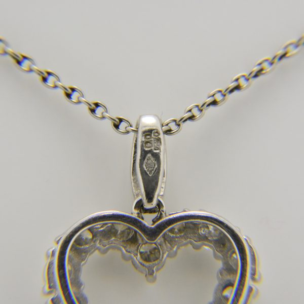 Platinum, diamond open heart pendant