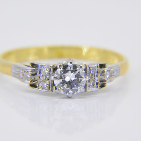 A vintage half carat solitaire diamond ring