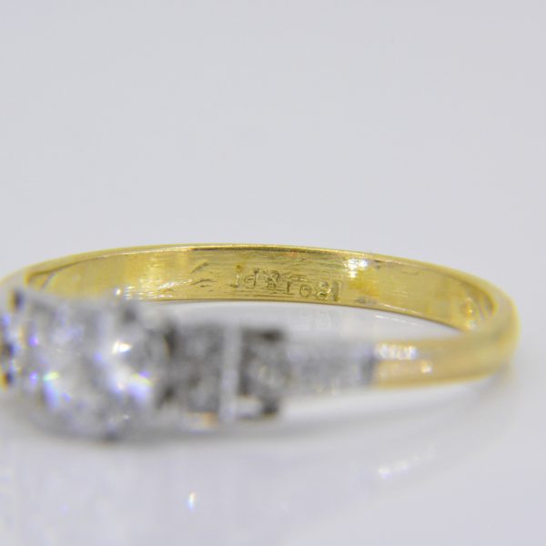 A vintage half carat solitaire diamond ring