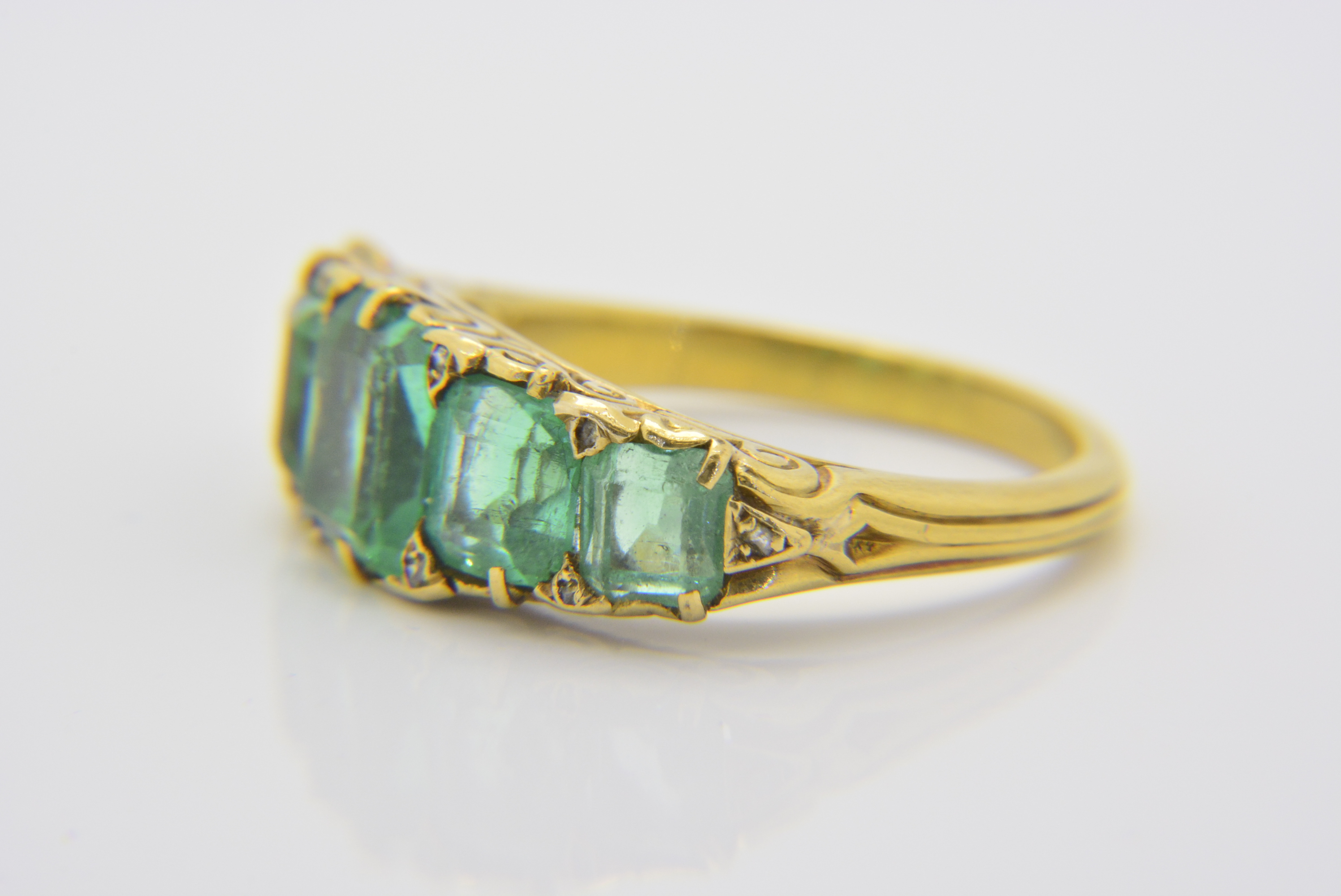 Emerald five stone ring | Emerald ring | Jethro Marles