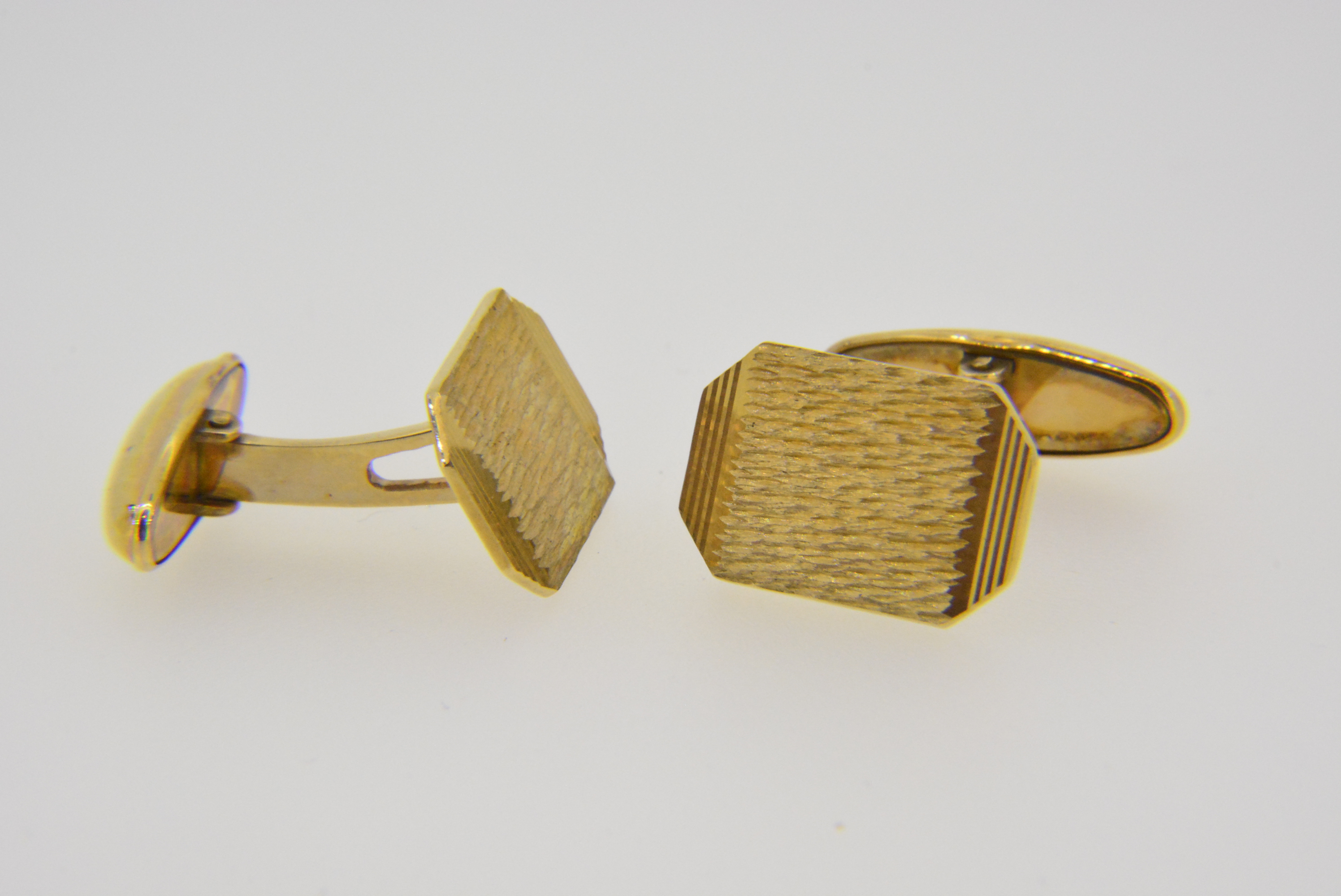 gold cuff links | A pair of gold cuff links | Jethro Marles