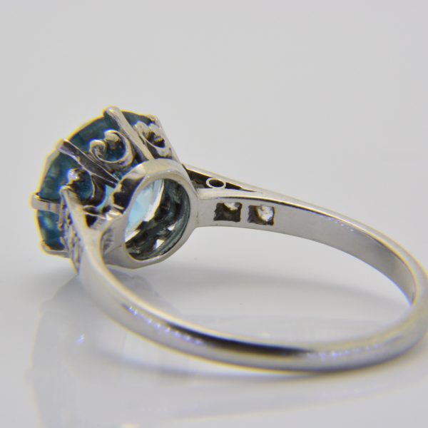 Blue zircon and diamond ring