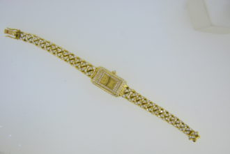 Diamond-set gold ingot wristwatch