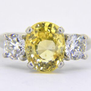 Yellow Sapphire and diamond three-stone ring with Jethro Marles