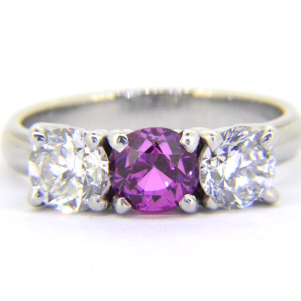 Pink sapphire and diamond three-stone ring with Jethro Marles