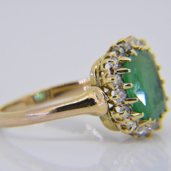 Gold, emerald & diamond cluster ring