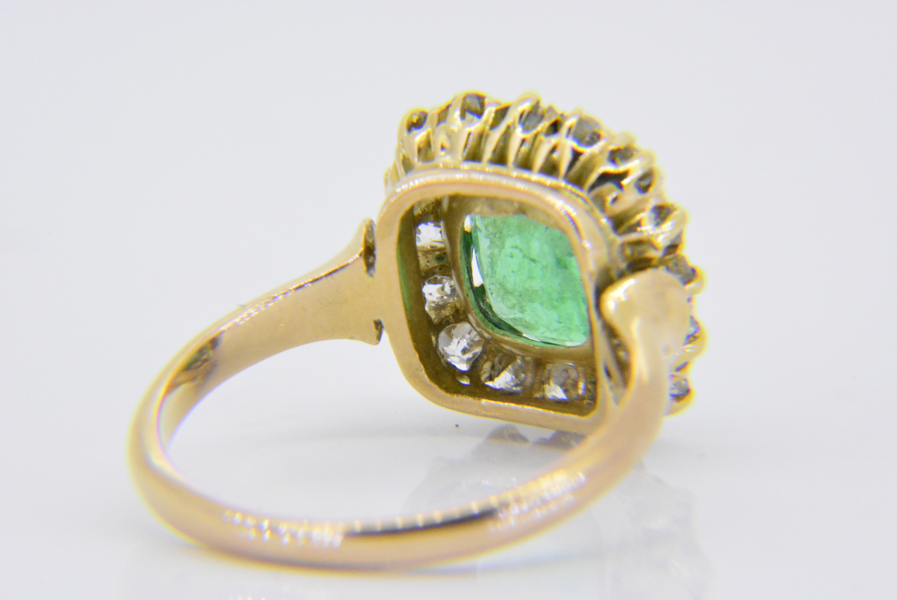 Emerald and diamond cluster ring | Jethro Marles