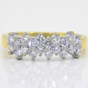 Diamond cluster half eternity ring