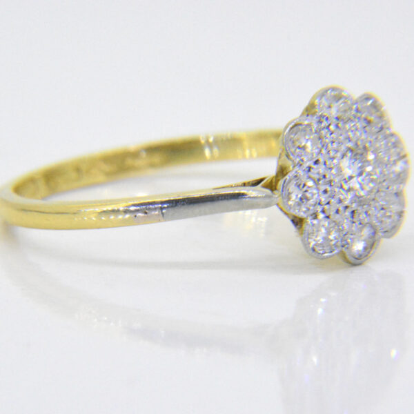 Vintage diamond cluster engagement ring