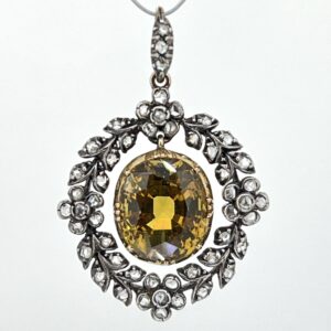 Golden yellow sapphire and diamond pendant with Jethro Marles