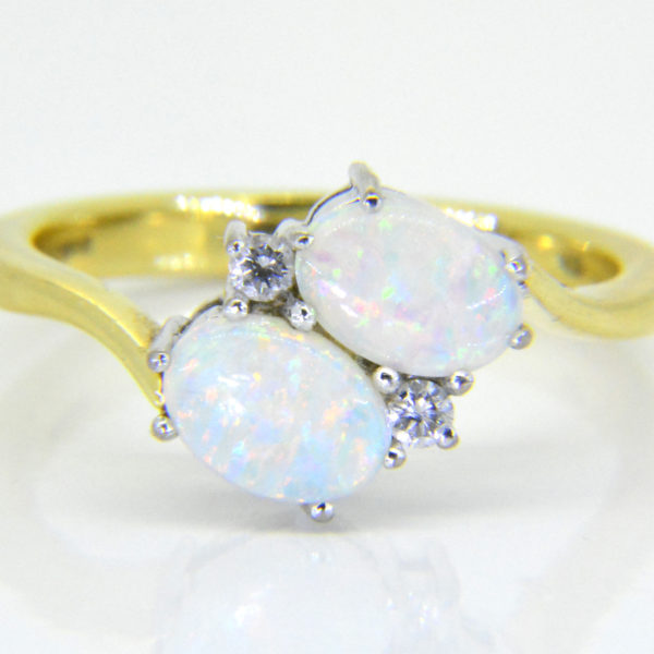 18ct opal diamond cross over ring
