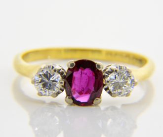 ruby diamond three stone ring